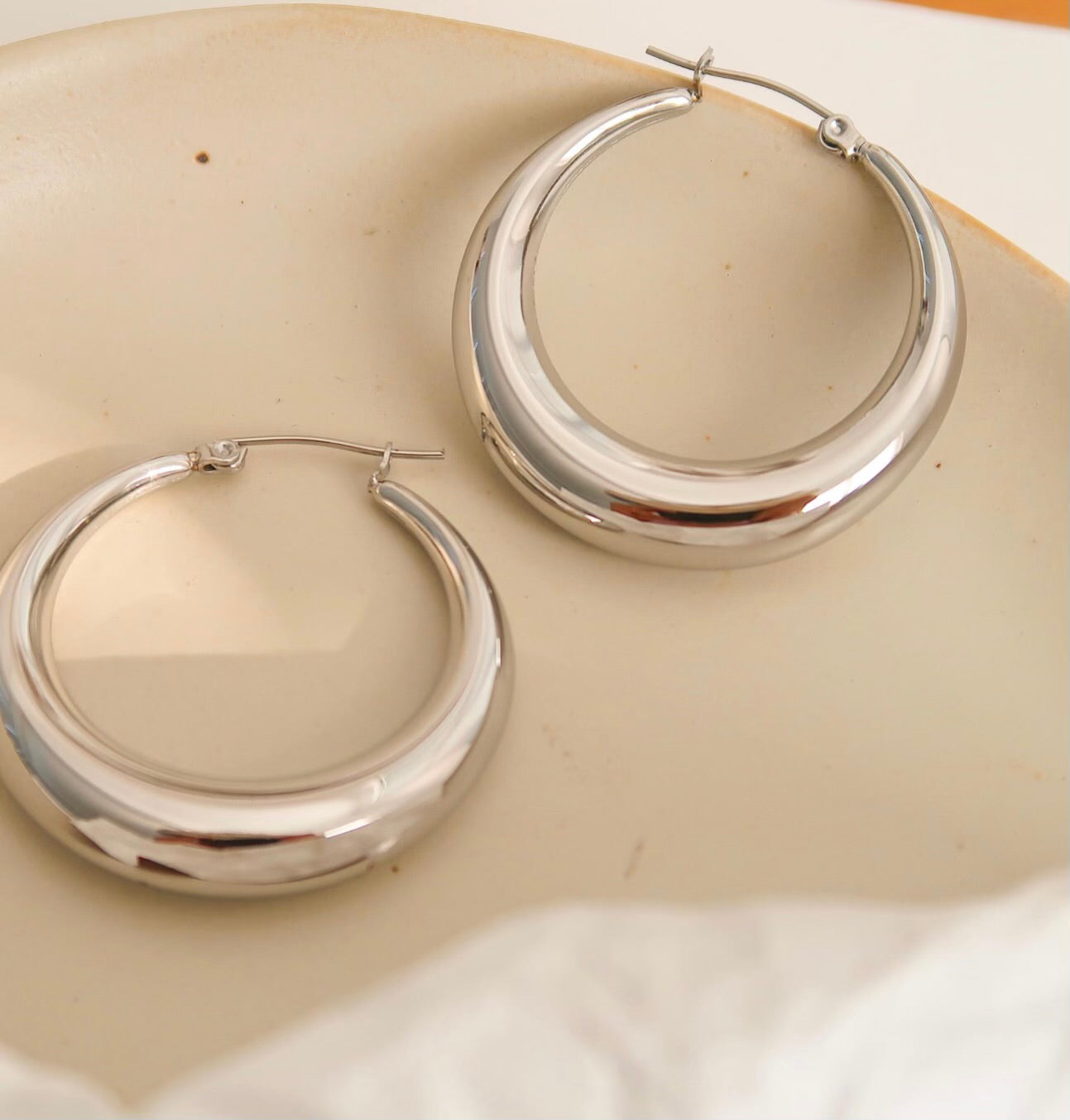 The Charlotte Rue Silver Loop Earrings “Circle of Faith”