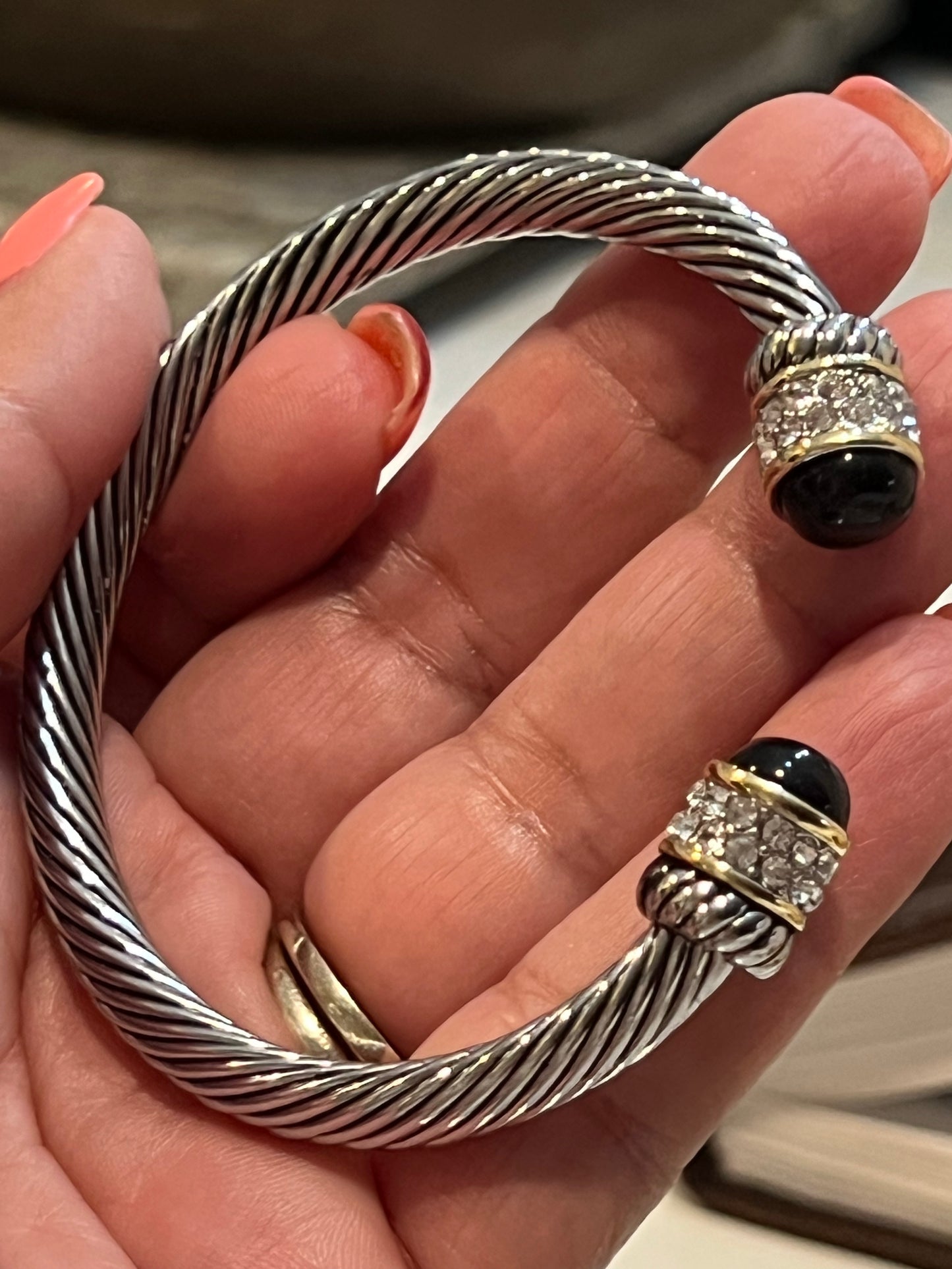 Silver with gold and black