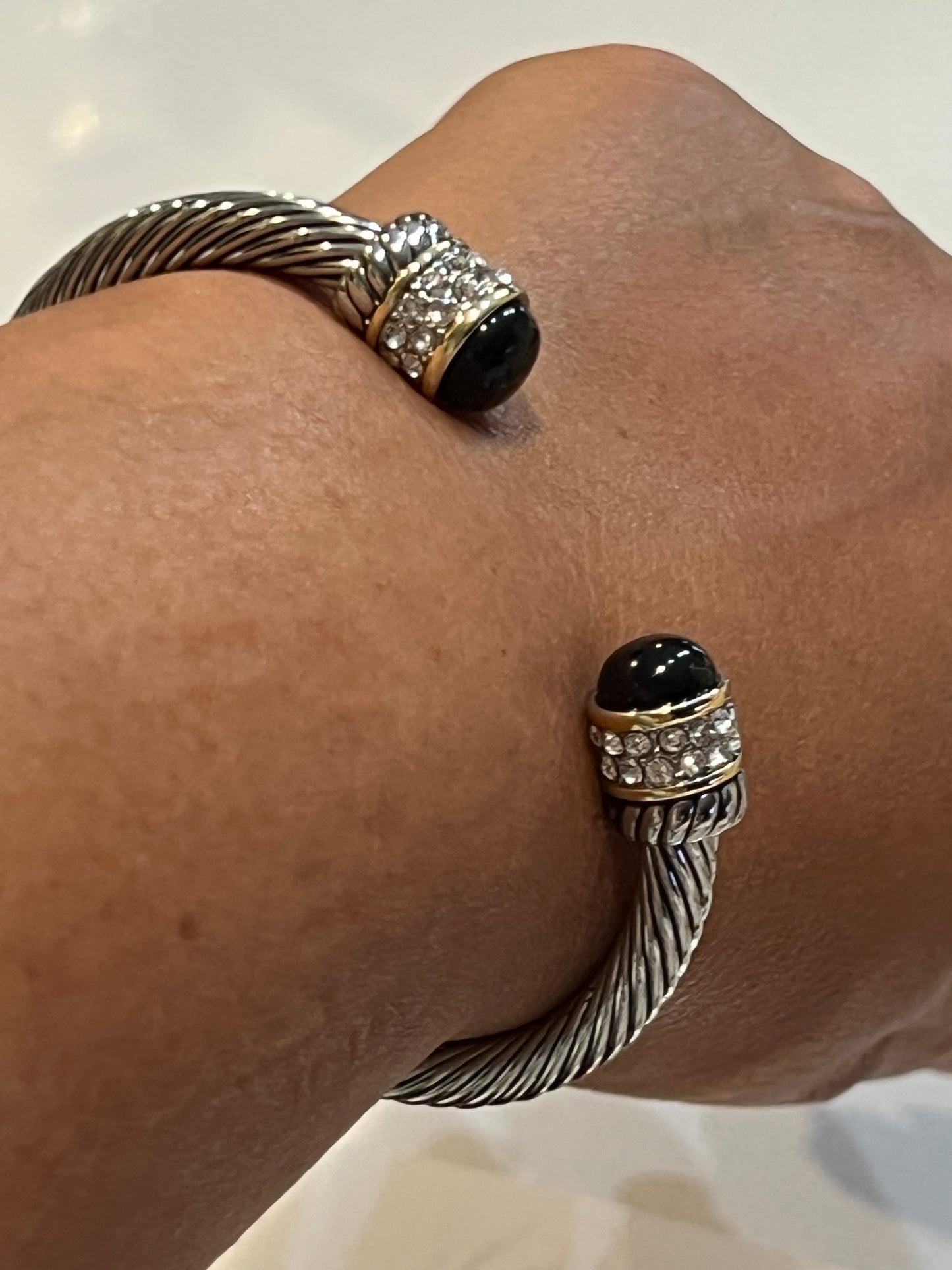 Silver with gold and black