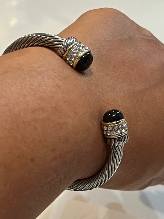 Silver with gold and black